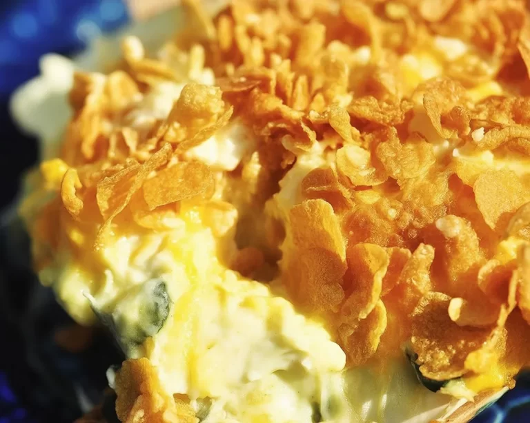 Delicious squash casserole with a buttery cracker topping, creamy and cheesy.