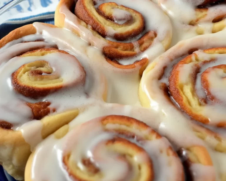 Delicious homemade cinnamon rolls, inspired by Cinnabon, ready to be enjoyed.