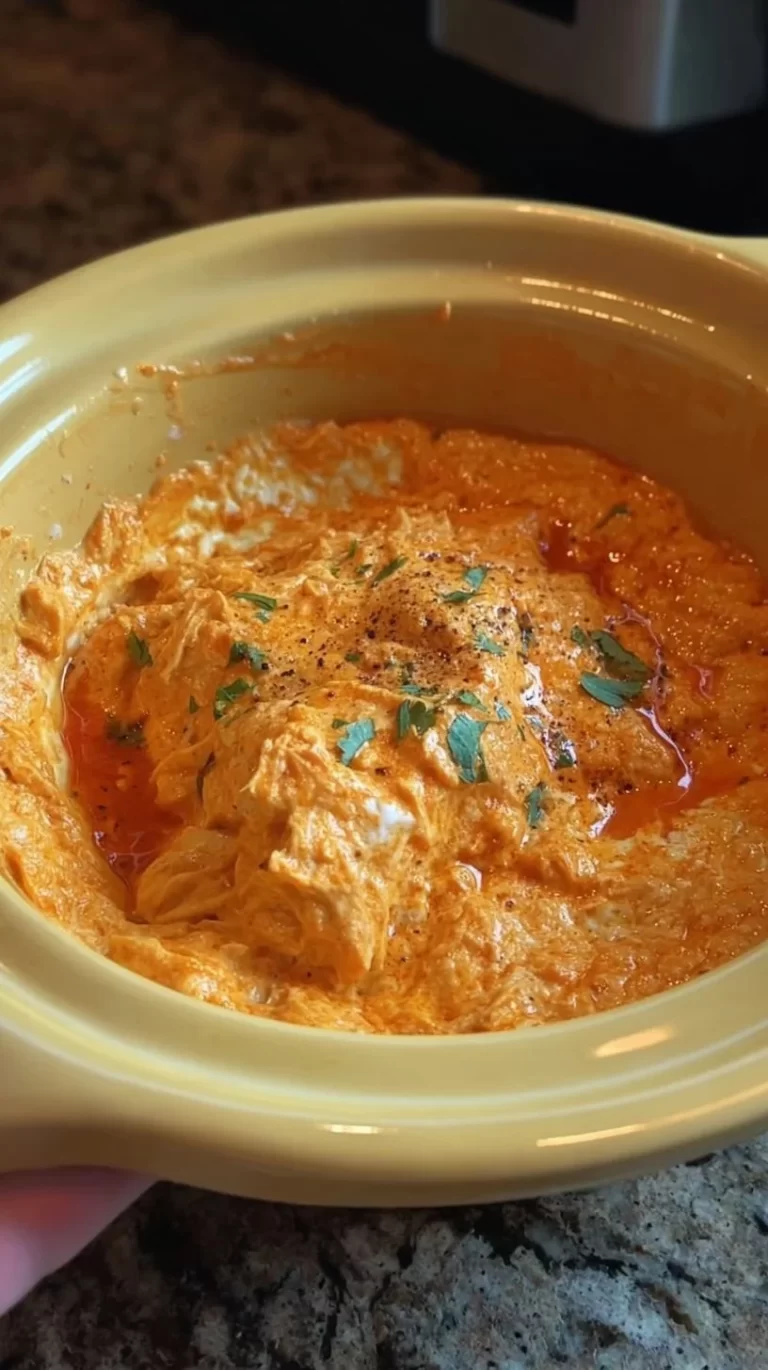 Creamy 5 ingredient Crock Pot Buffalo Chicken Dip served in a bowl